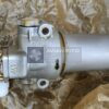 8D2.966.236 fuel filter side view with mounting holes, flow-direction arrow and capped ports