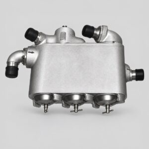 722.600T fuel filter assembly with wide metal housing, four capped connections and three lower bowls